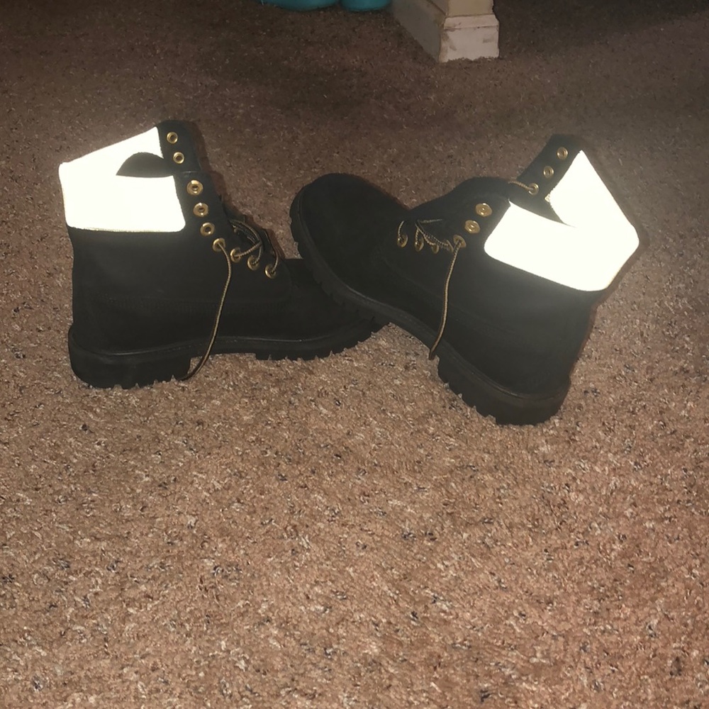 Black and gold Timberlands
